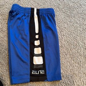 Lightly worn, size large boys blue Nike Elite shorts